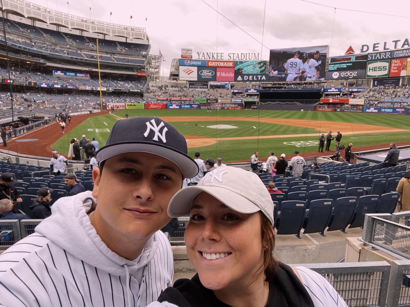 Catie and Joe at a Yankees game at Yankee Stadium
